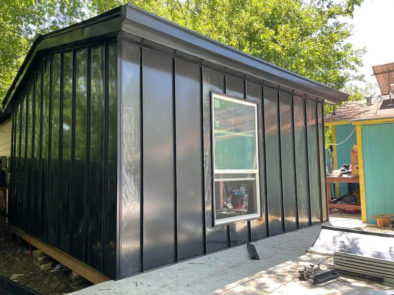 Black standing seam metal wall panels for Metal Roof Installation in Trumann